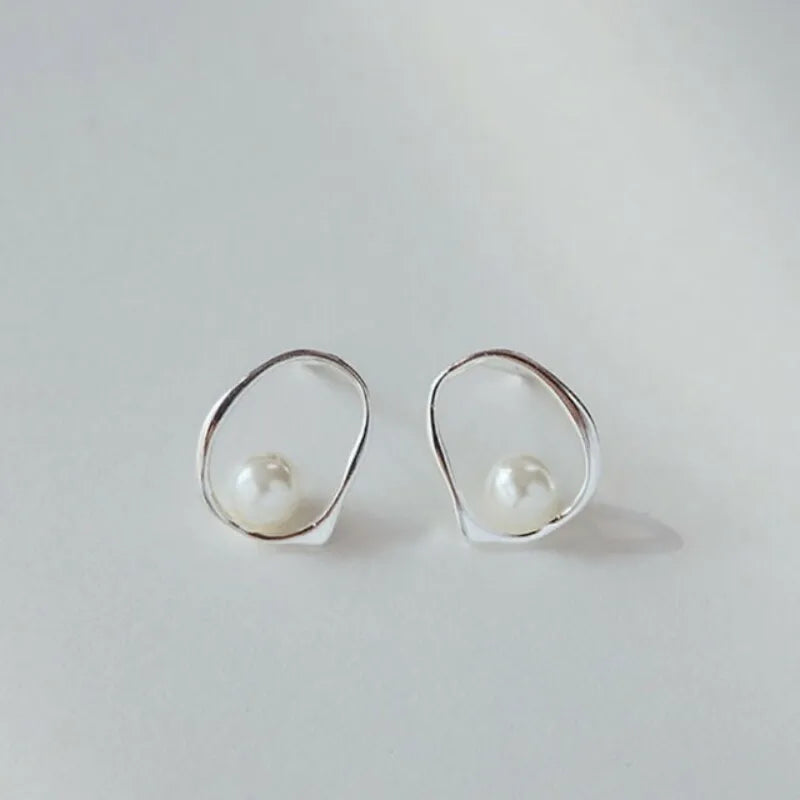 woman Ball Earrings